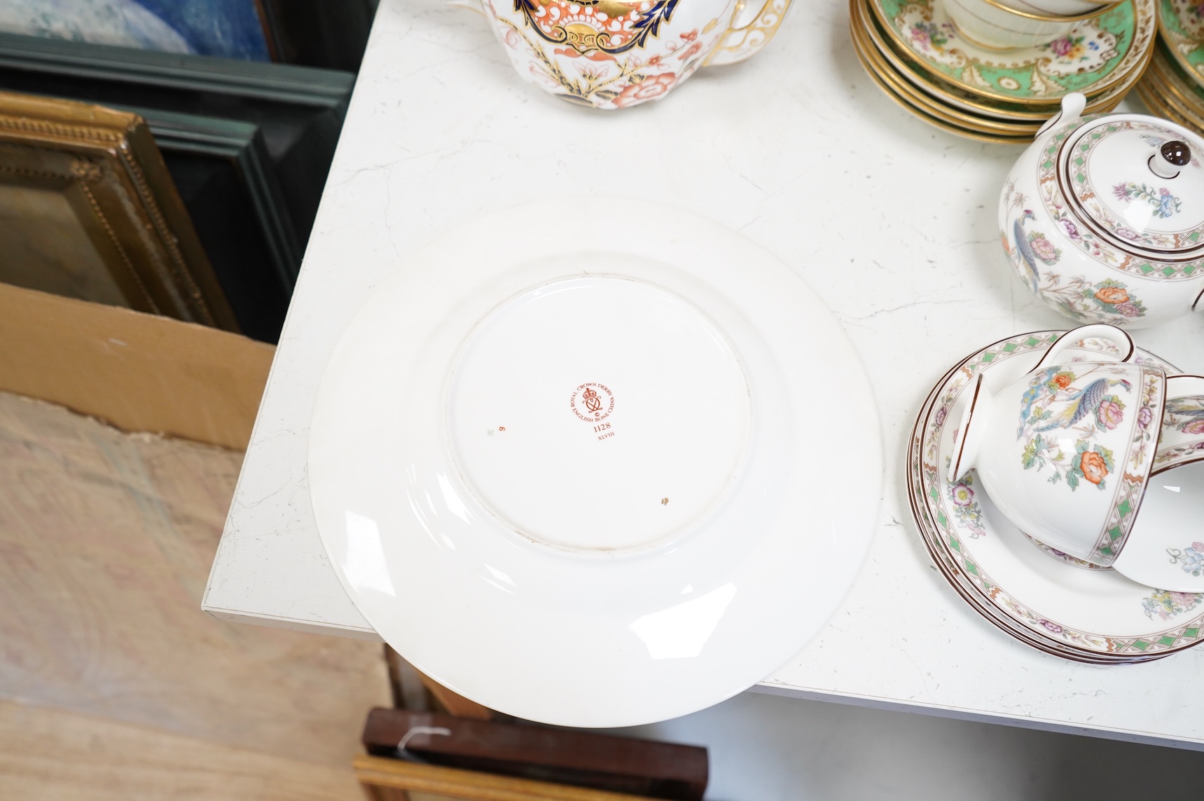 A Wedgwood Kutani crane part tea service, a collection of Cauldon tea wares and two pieces of Crown Derby Imari, largest 27cm in diameter
